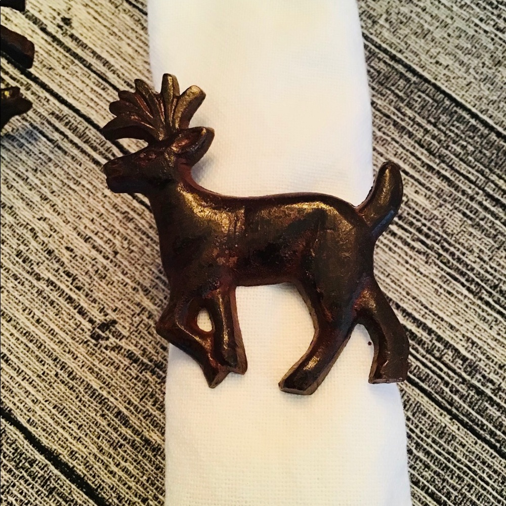 4 napkin rings (deers in brown metal )